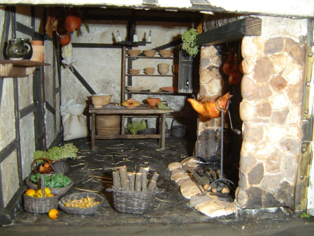 A Fogadó az odaadó parasztlányhoz konyhájában például egy lakoma előkészületeit láthatjuk.